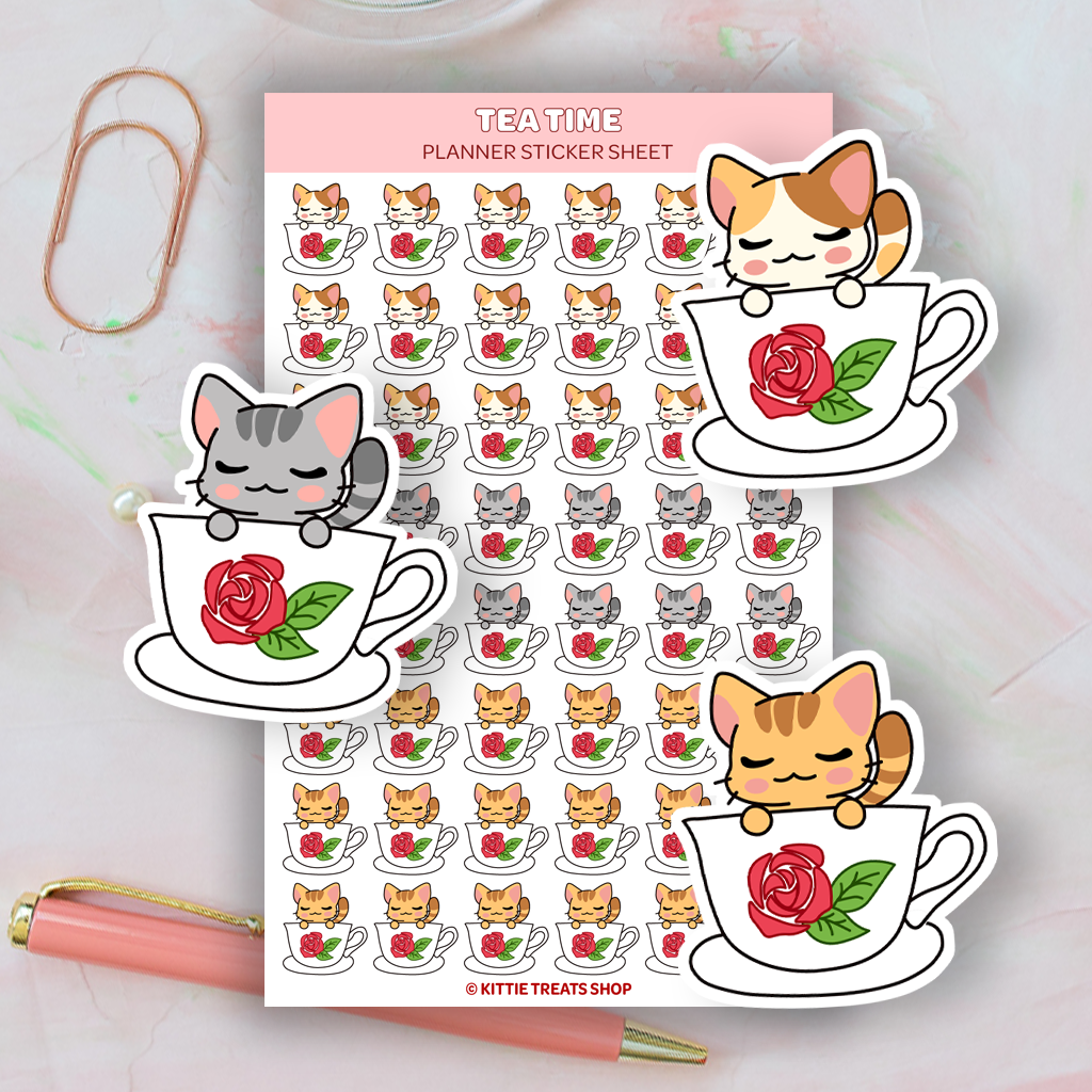 Planner stickers featuring kitties peeking out of a tea cup