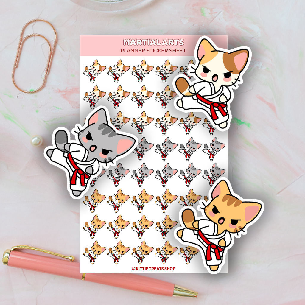 Planner sticker featuring cats doing a karate kick while wearing red belts